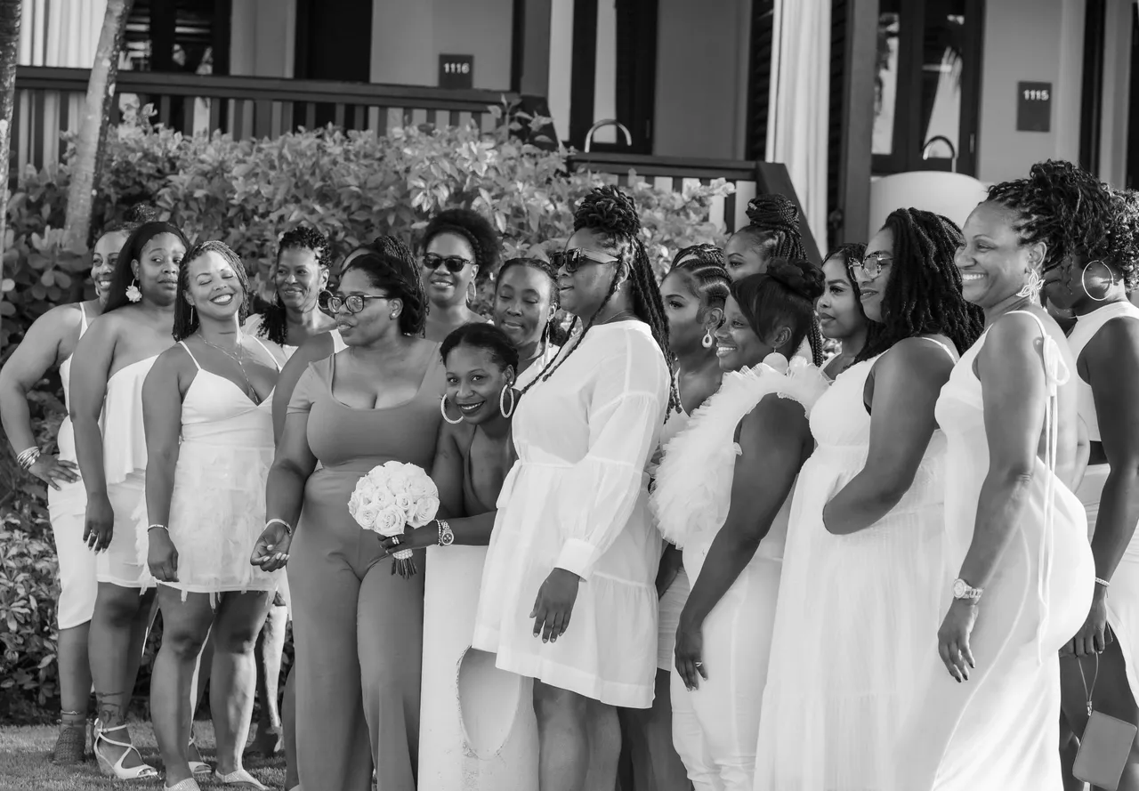 A group of women standing next to each other.