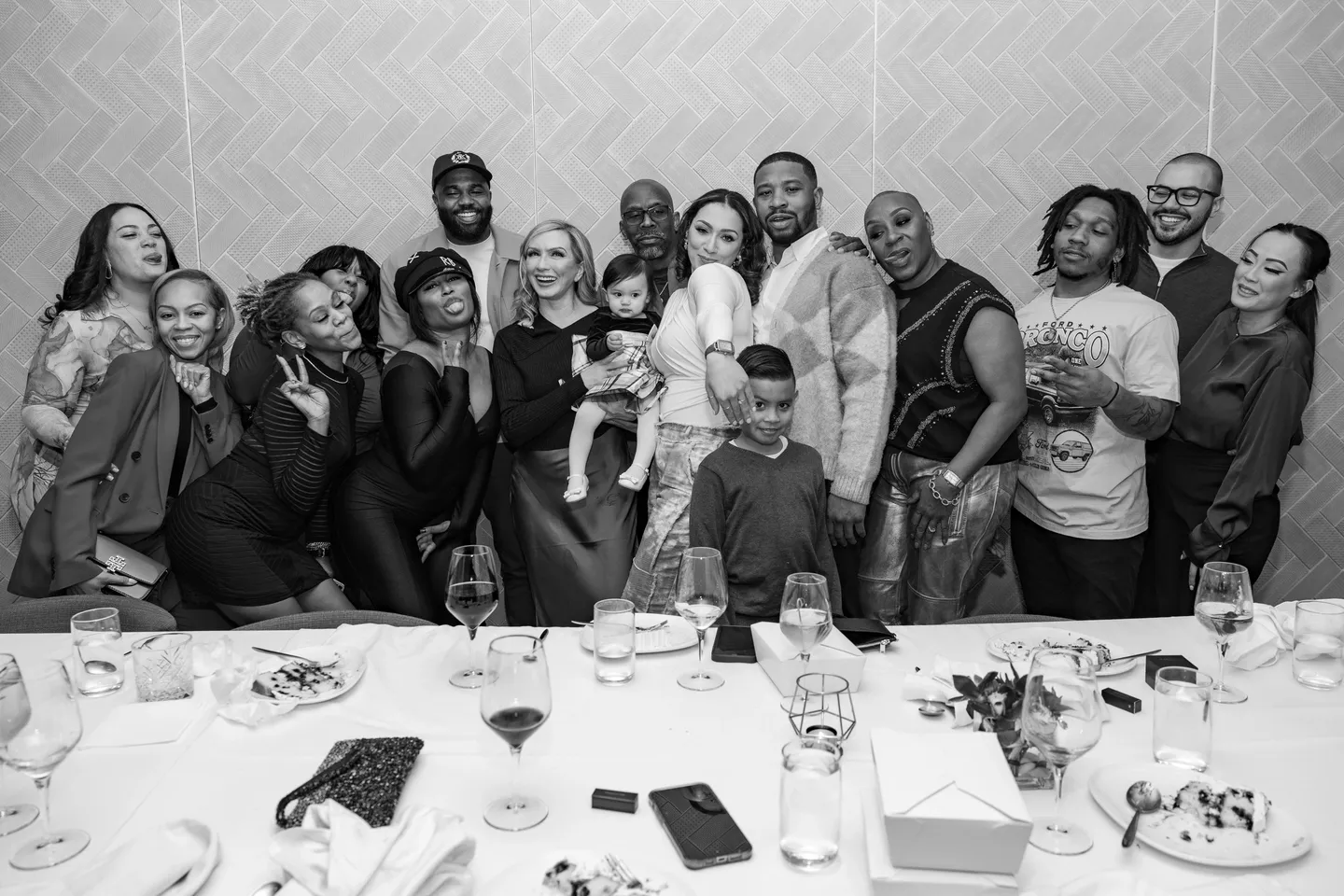 Group of people gathered around a table.